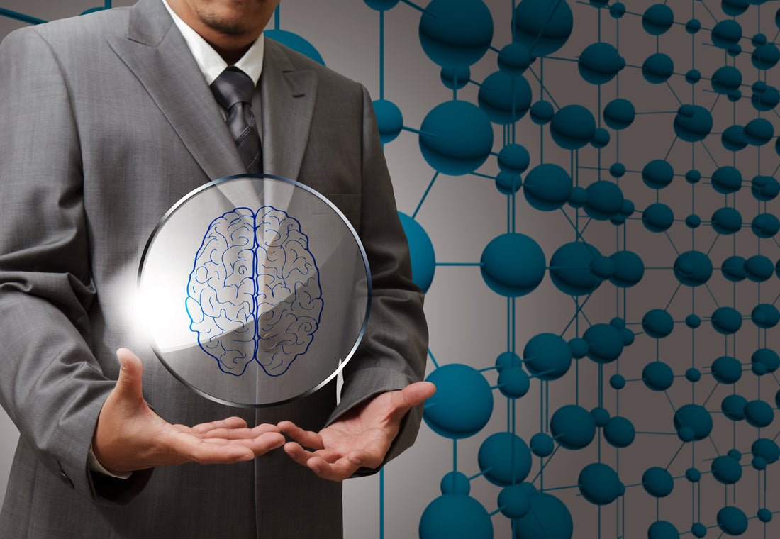 A man holding a brain sign 