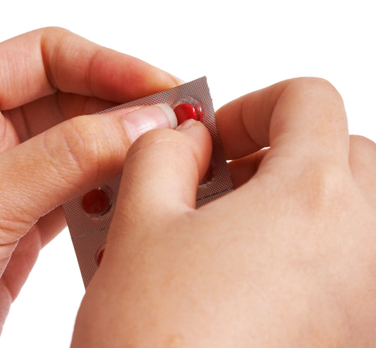 Removing pill from pocket